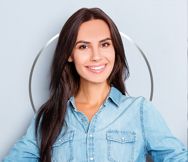 Smiling young woman standing confidently, happy after Canesten cystitis treatment